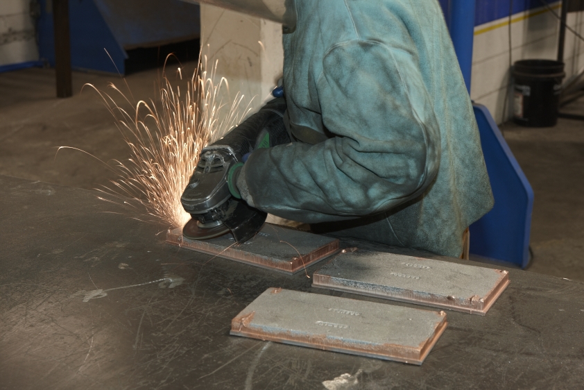 Abreco Laminated White Iron Plate being prepped